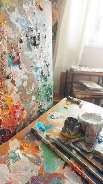 istock Brush and bright oil-paint palette for background 639086028