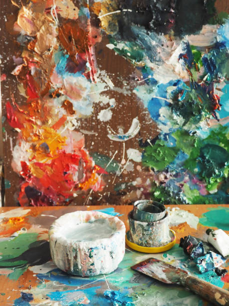 istock Brush and bright oil-paint palette for background 639086308