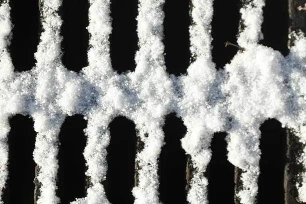 snow-covered manhole cover
