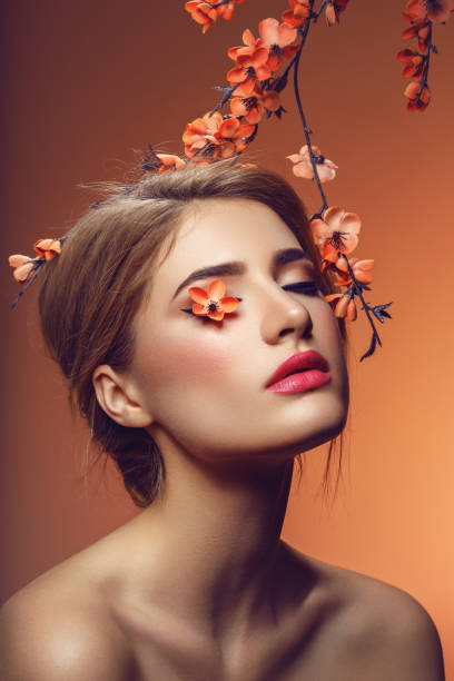 istock Beautiful girl with sakura branch 639088888