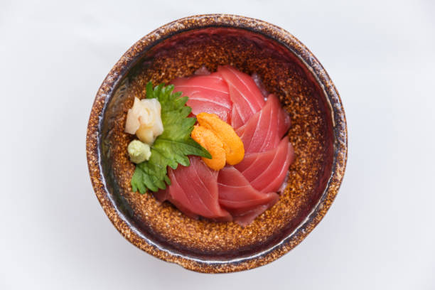 maguro-don with sea urchin served with wasabi and prickled ginger. - green sea urchin fotos imagens e fotografias de stock