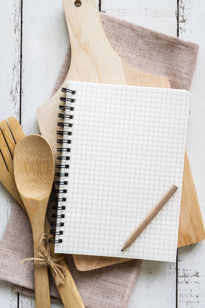 istock Blank notebook with wooden utensil 639090662