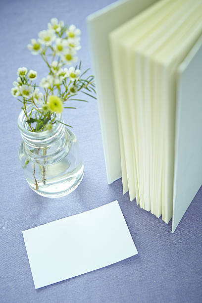 istock Flowers in vase with book 639090762