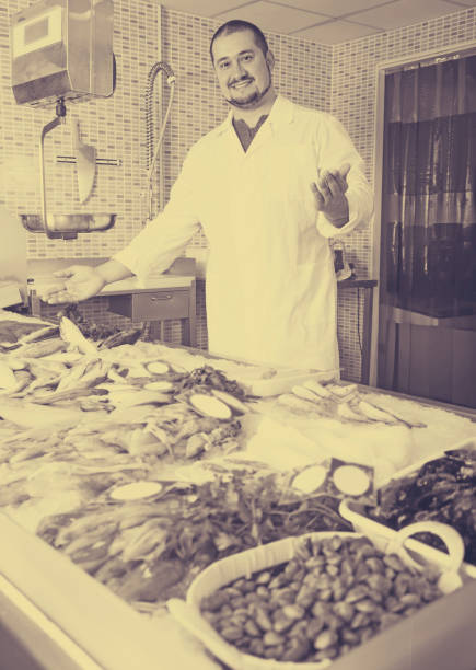 120+ Man Eating Squid Stock Photos, Pictures & Royalty-Free Images - iStock