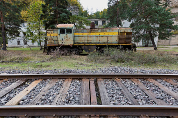 istock Old railroad and an old locomotive 639097538