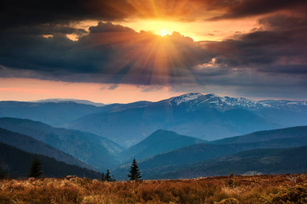 istock Colorful sunset in the mountains landscape. Dramatic overcast sky. 639097786