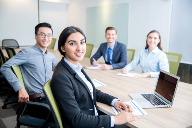 istock Smiling Business Lady Working with Colleagues 639097828
