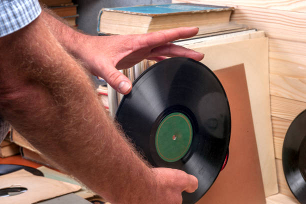 istock Browsing through vinyl records collection. Music background. Copy space 639100146