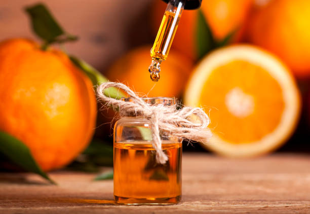 orange essential oil - drop herbal medicine leaf perfume imagens e fotografias de stock