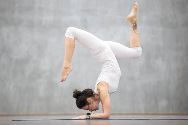 istock Beautiful Yoga: Handstand with bending legs 639103964