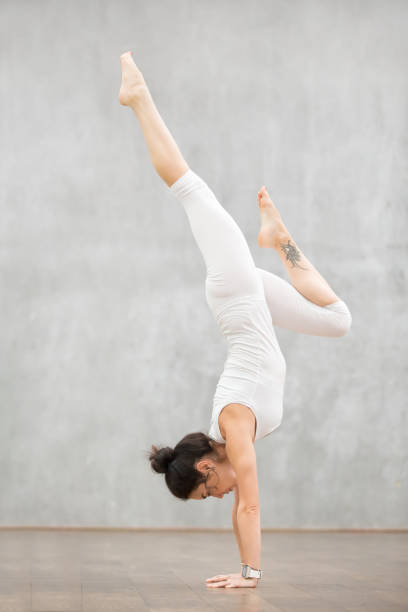 istock Beautiful Yoga: Adho Mukha Vrksasana pose 639103998