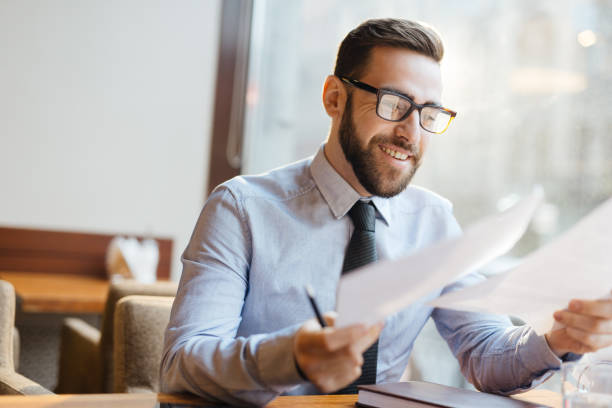 istock Satisfied entrepreneur in cafe 639105478