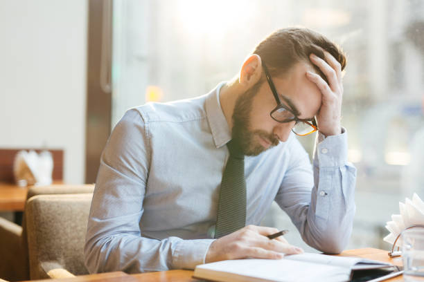 istock Businessman thinking hard 639105516