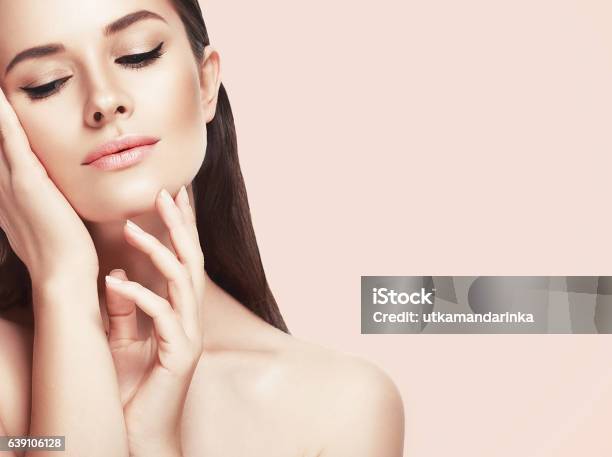 Beautiful Woman Face Close Up Studio On Pink Stock Photo - Download Image Now - Women, Beauty, Human Face