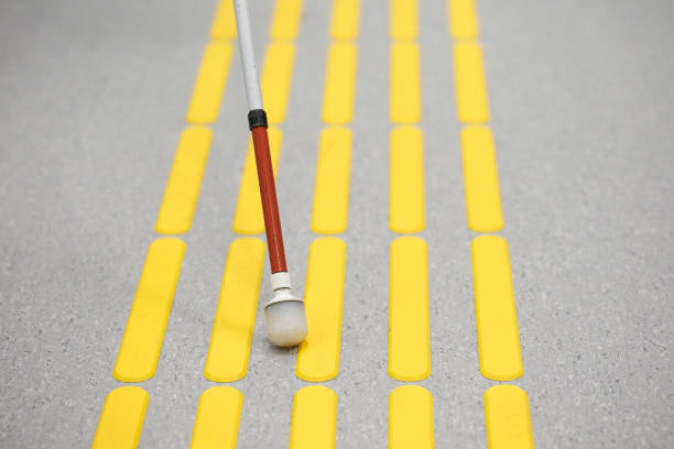 istock Blind pedestrian walking on tactile paving 639111602