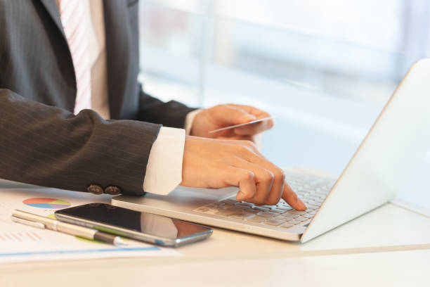 istock Businessman doing online banking. 639114286