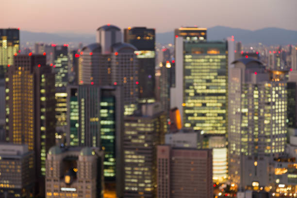 istock Office building blurred lights night view 639120126