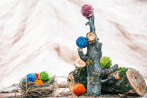 istock Yarn balls in natural log interior 639120528
