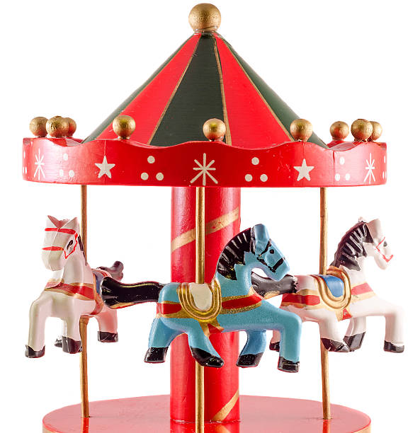 istock Colored carousel toy with horses, close up, isolated 639122346