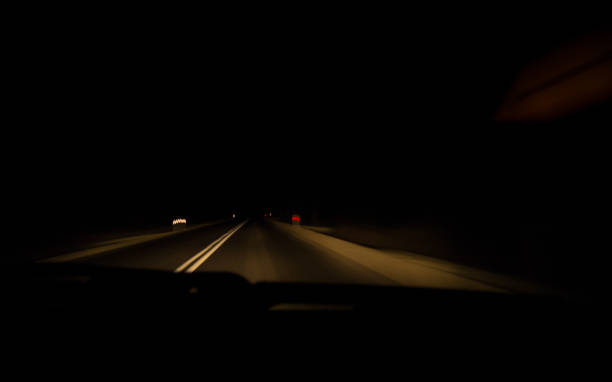 istock Driving a car at night 639127642