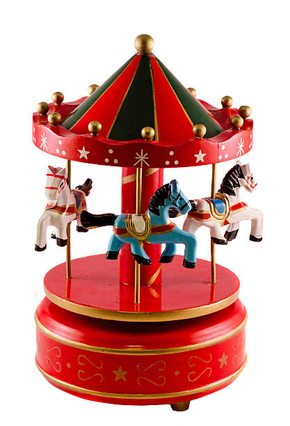 istock Colored carousel toy with horses, close up, isolated 639128040
