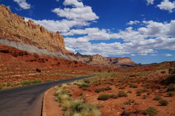 istock Road along a tilted geologic fold, sequence of sedimentary rock 639128486