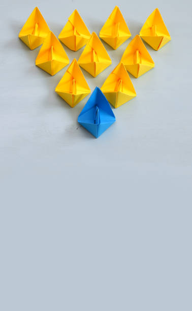 istock Leadership concept with paper boats 639136094
