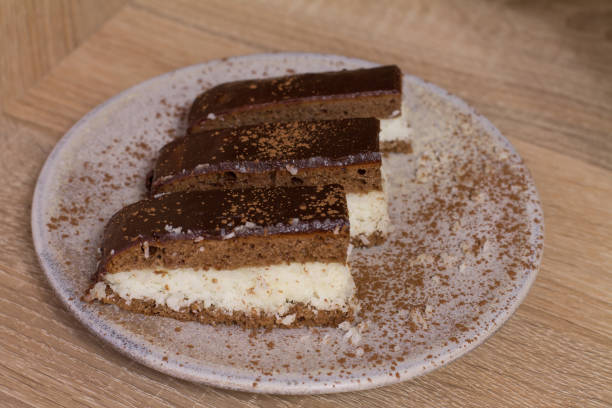 istock Chocolate cake `Bounty`  with coconut on wood 639139400