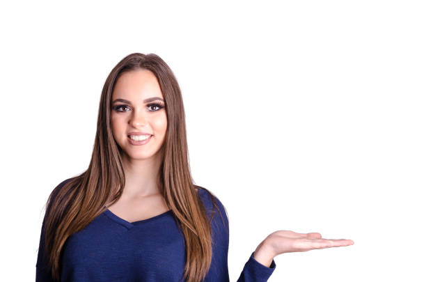 istock Beautiful young girl holding an empty hand outstretched. 639140896