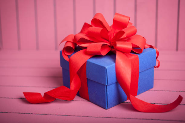 istock Blue gift box with red ribbon and bow 639141666