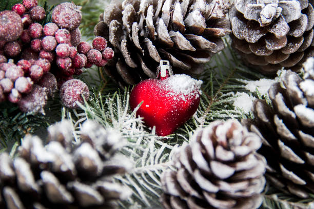 istock Christmas background with holly, pine cone, gift boxes, bauble 639142028