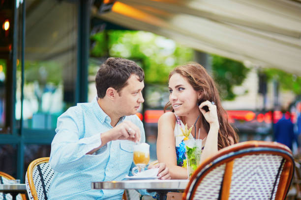 istock Romantic loving couple in Parisian cafe 639143044
