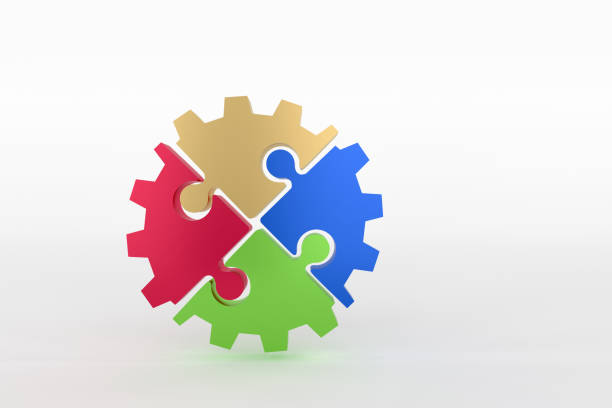 istock colorful gear puzzles for teawork concept 639144988
