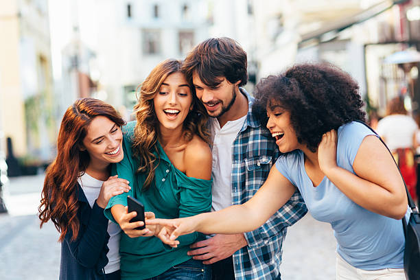 istock Friends texting outdoor 639145930