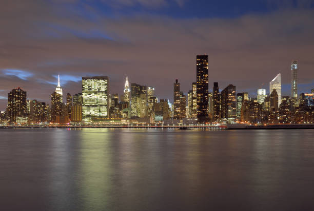 istock Manhattan skyline at night. 639148138
