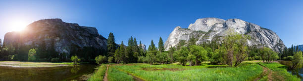istock River surrounded by rocky mountains panoramic view 639148450