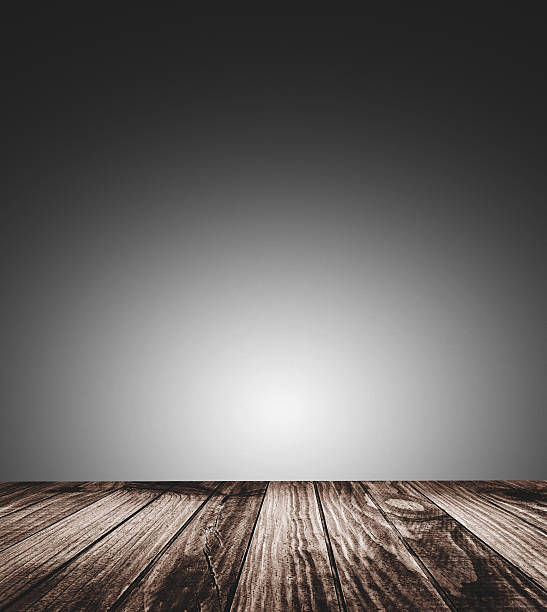 istock Plank wood against gray wall 639149378