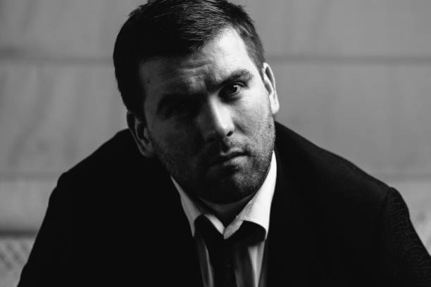 istock serious man close-up portrait 639149554