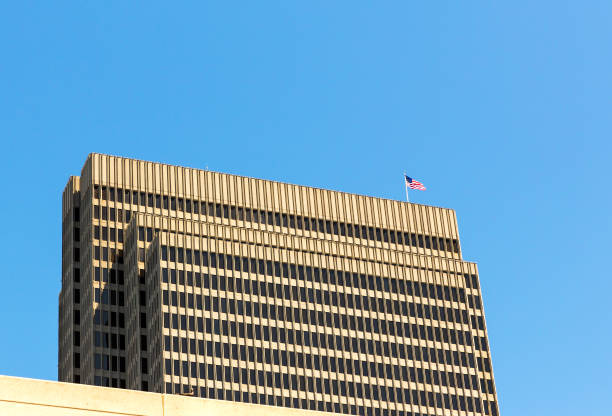 istock Skyscraper with US flag on roof 639151004