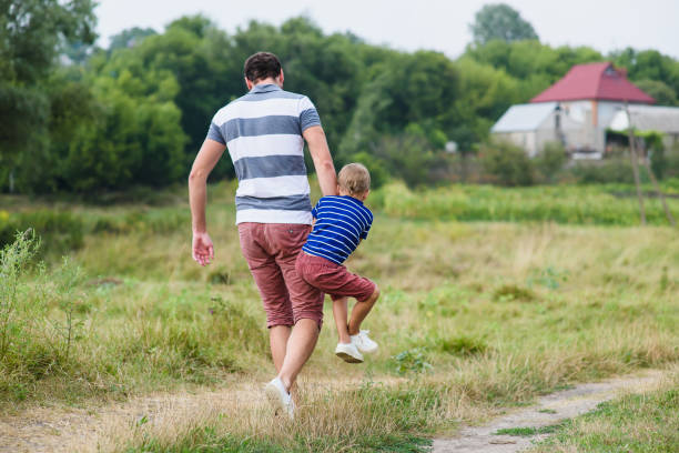 istock Father playing with his son 639151362