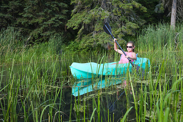 istock Teen exploring a wild river 639151486