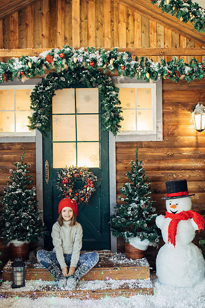 istock Little girl playing with snow 639151544