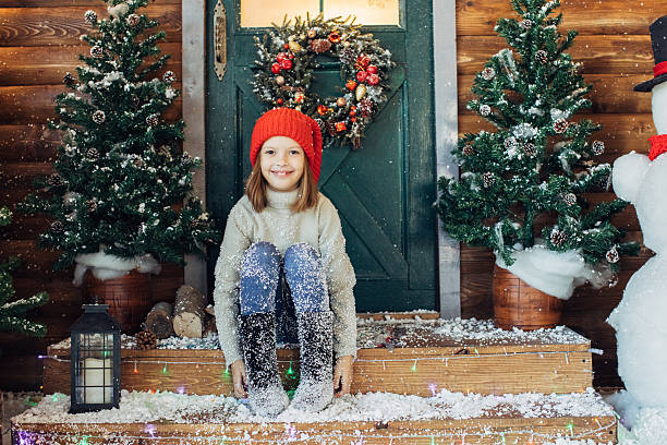 istock Little girl playing with snow 639151666