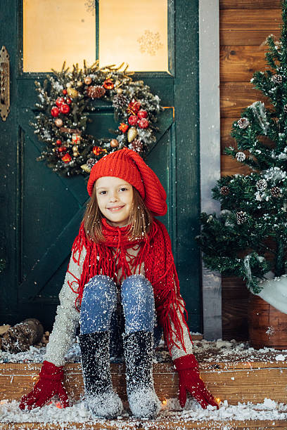 istock Little girl playing with snow 639151792