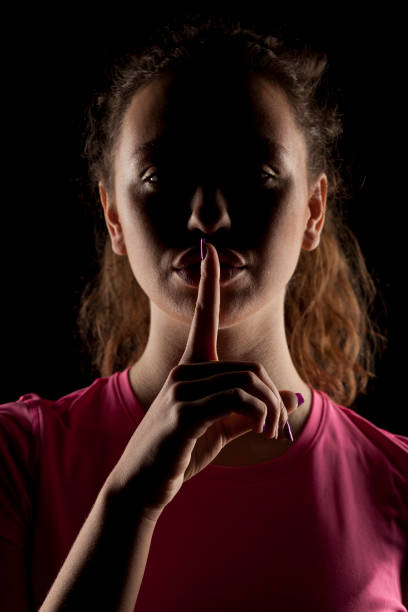 istock girl with the face in shadow 639156404