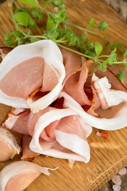 istock prosciutto on wooden board 639156946