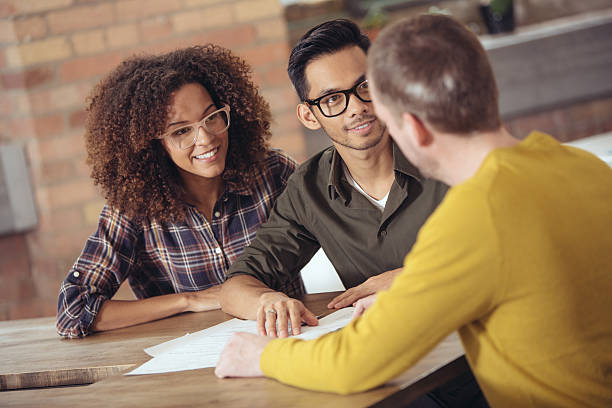istock Couple getting financial advice 639157772