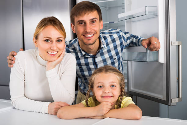família seleccionar frigorífico - three different refrigerators imagens e fotografias de stock
