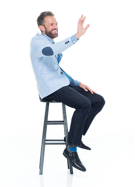 istock Smiling smart casual man gesturing 639165440