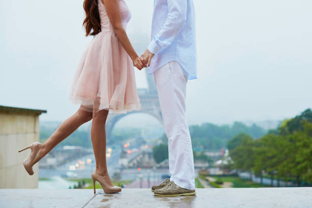 istock Unrecognizable couple in front of the Eiffel tower in Paris 639165752